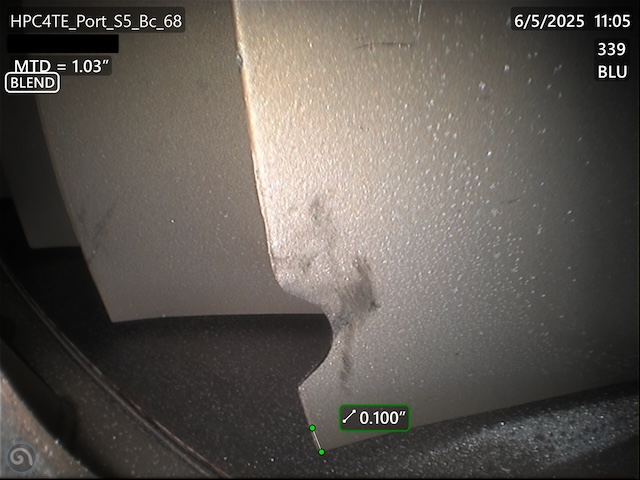 Engineer verifying that the blend repair has not exceeded tip clearance limits